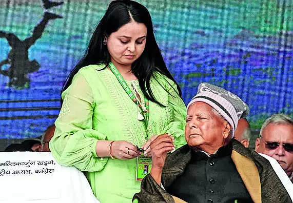 File photo of RJD chief Lalu Prasad with his daughter Rohini Acharya at the Jan Vishwas rally held on March 3 in Patna