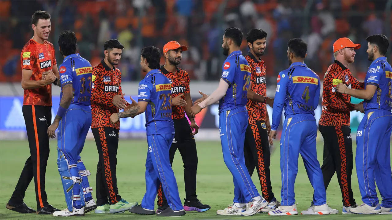 Mumbai Indians and Sunrisers Hyderabad players greet each other after the match. (IANS Photo)