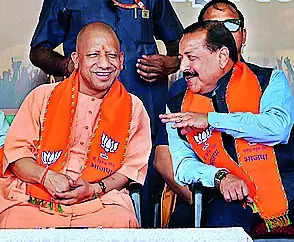 Chief Minister Yogi Adityanath and Union Minister Jitendra Singh during a public meeting, in Kathua on Wednesday