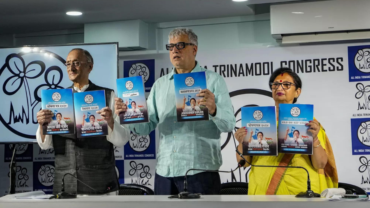 TMC leaders Amit Mitra, Derek O'Brien and Chandrima Bhattacharya release the party's election manifesto for the Lok Sabha elections, in Kolkata. (PTI photo)