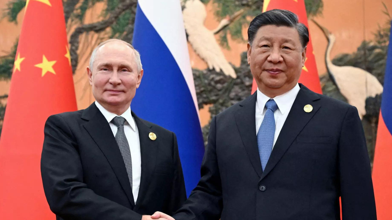Putin visits Xi as US threatens China sanctions over ties