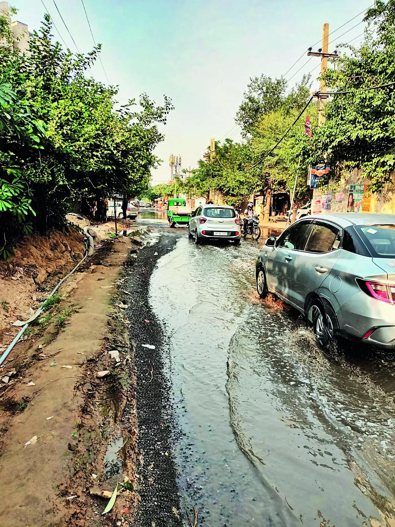 Overflowing drains & potholes: This road is an accident hotspot