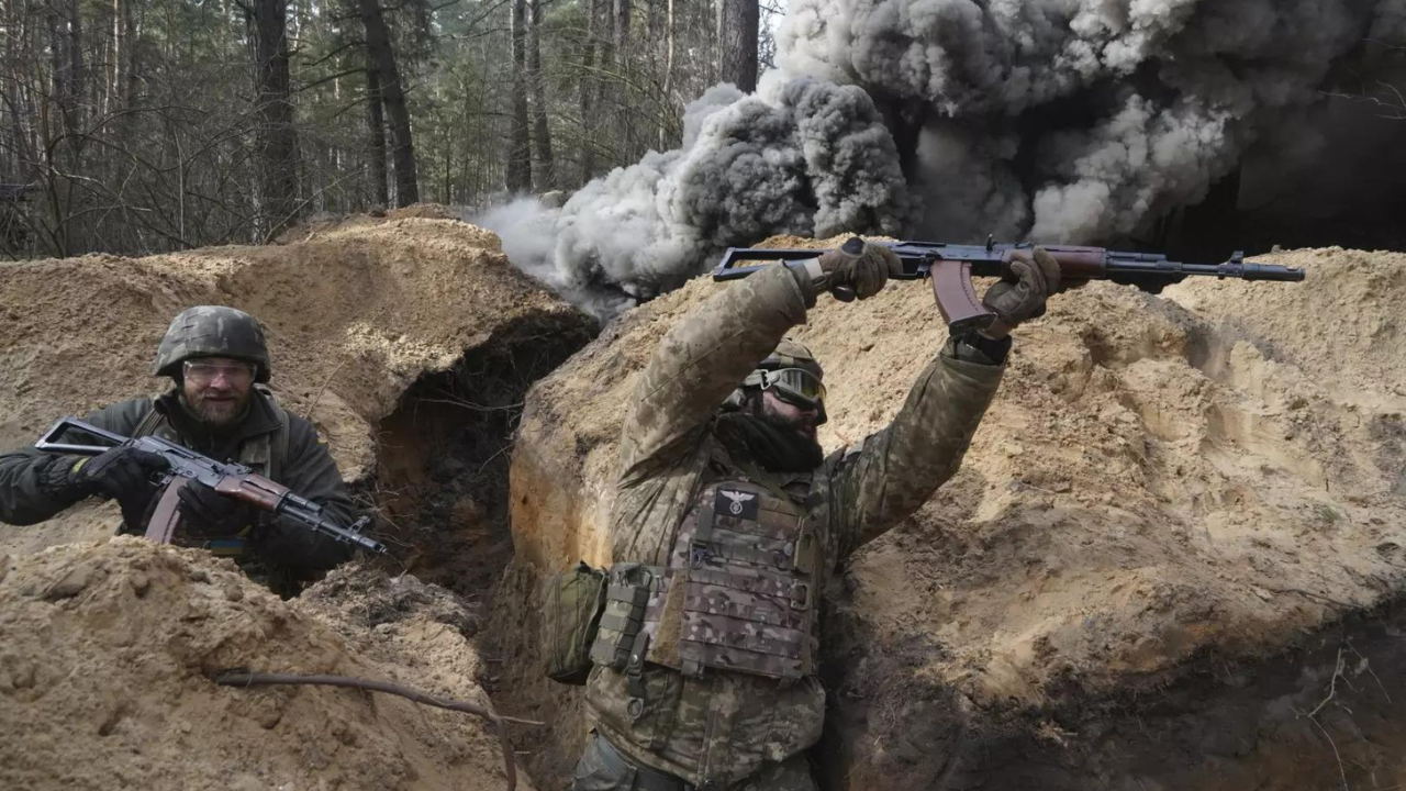 Ukraine fights Russian forces in north of border town in Kharkiv region