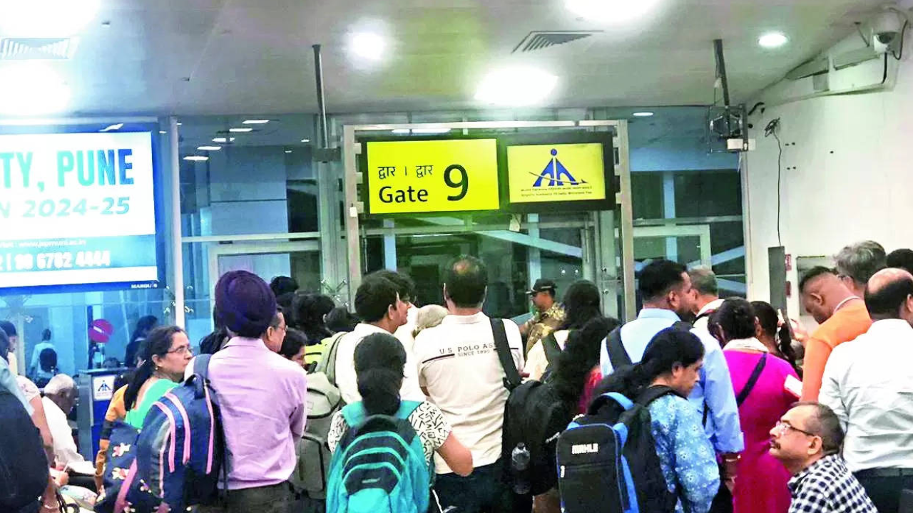 Taxiing AI aircraft collides with luggage tractor at airport