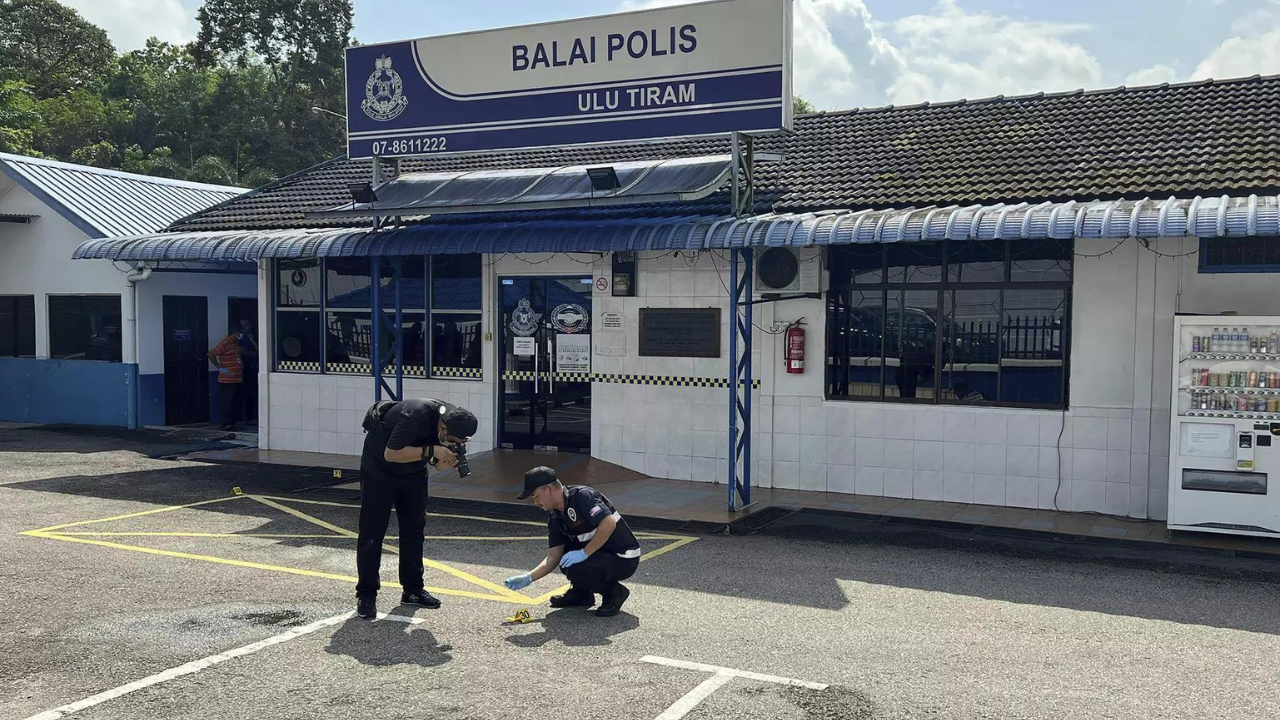 A man in Malaysia who killed 2 police officers acted on his own, a minister says