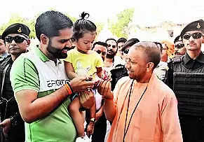 CM Yogi Adityanath does 'Gau Seva' at Gorakhnath temple