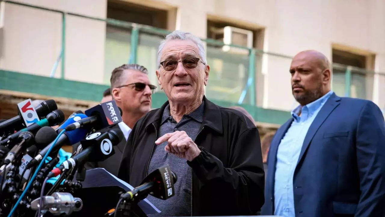 De Niro calls Trump supporters 'gangsters' in heated exchange outside court