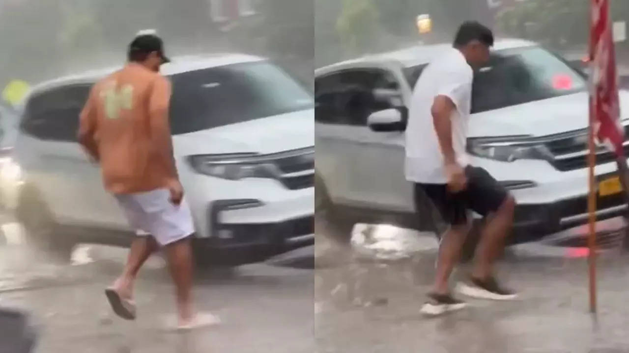 Watch: Rohit, Dravid dash through rain to catch cab in New York