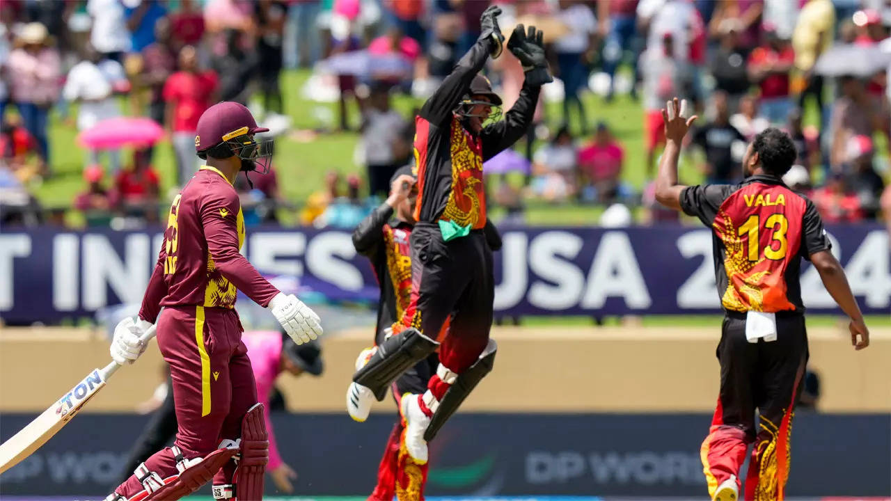 West Indies 77/3 in 13.0 Overs | WI vs PNG T20 World Cup Live Score: Nicholas Pooran falls but West Indies on course in 137 chase – The Times of India