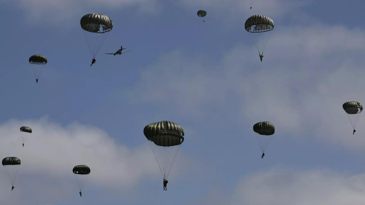 A mass parachute jump over Normandy kicks off commemorations for the 80th anniversary of D-Day