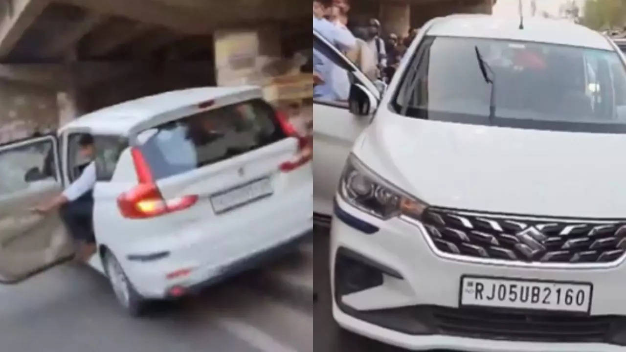 Viral video: Traffic cop risks own life to catch taxi driver trying to flee