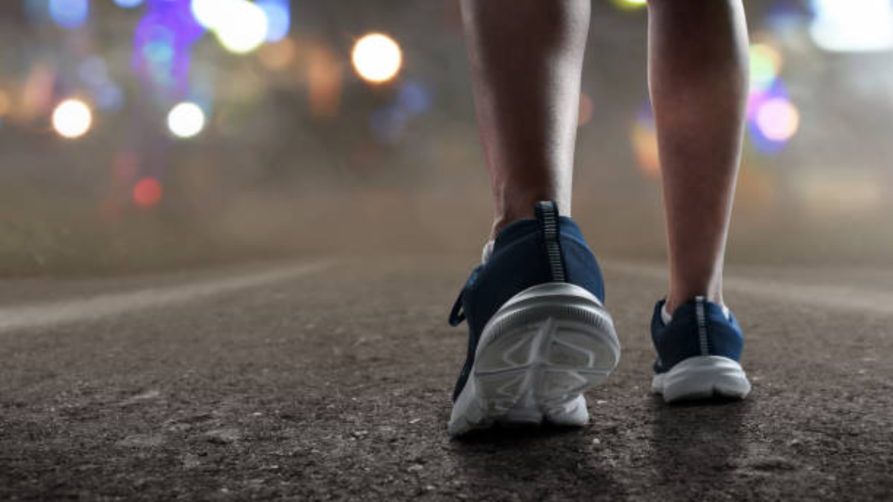 How many calories are burned in walking 1 km?