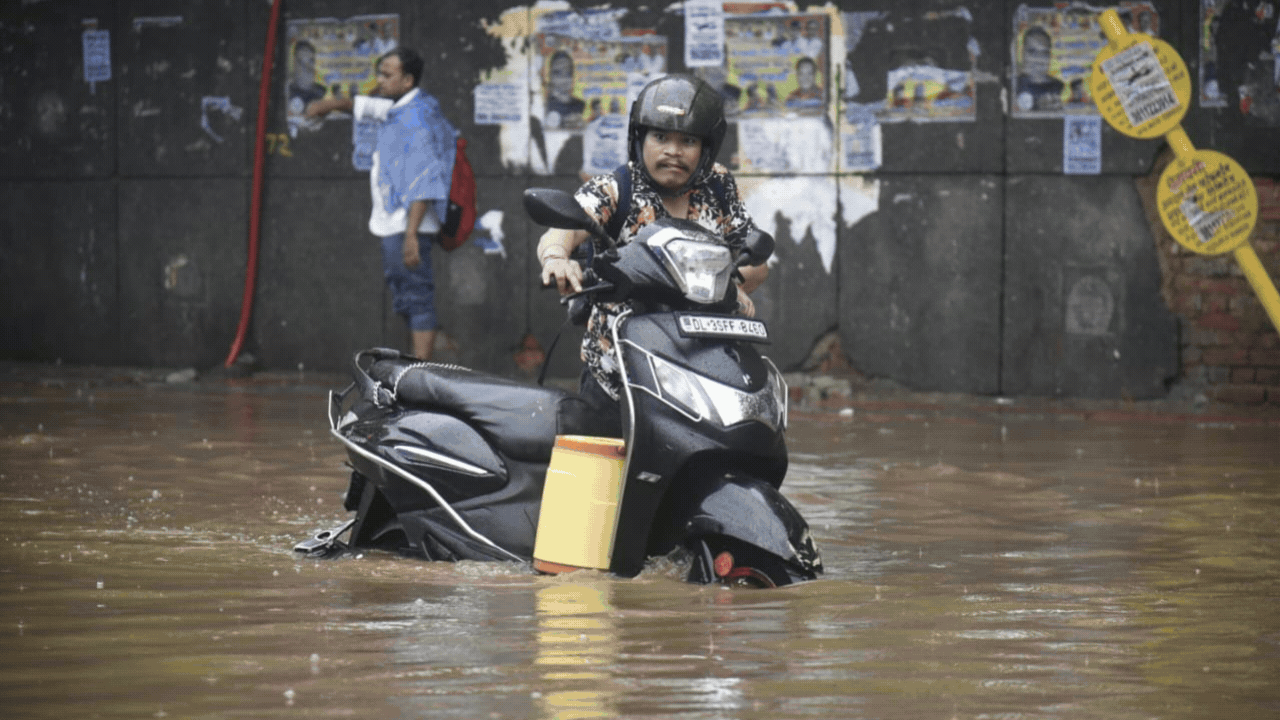 Delhi goes underwater: Hundreds of vehicles breakdown, thousands stuck in traffic, IGI airport roof collapses