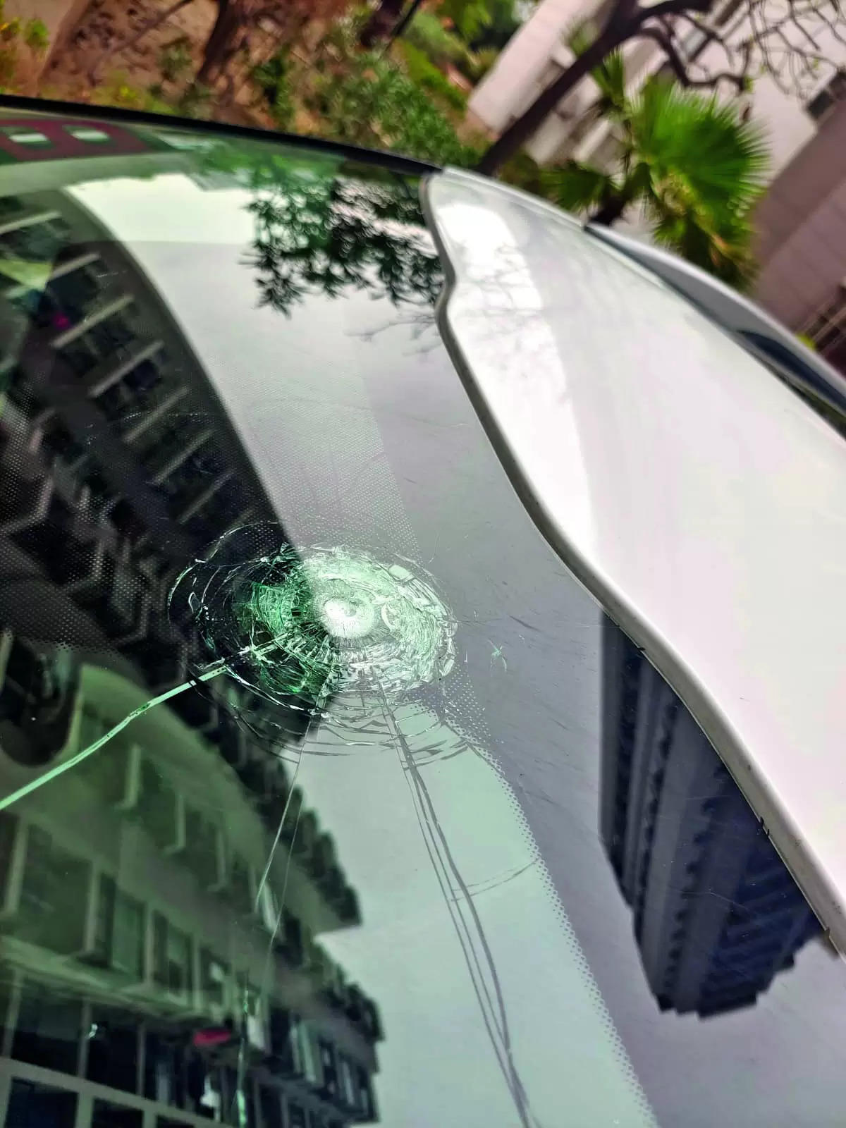 Crack in windshield, pellet spark gunshot fears in Noida condo
