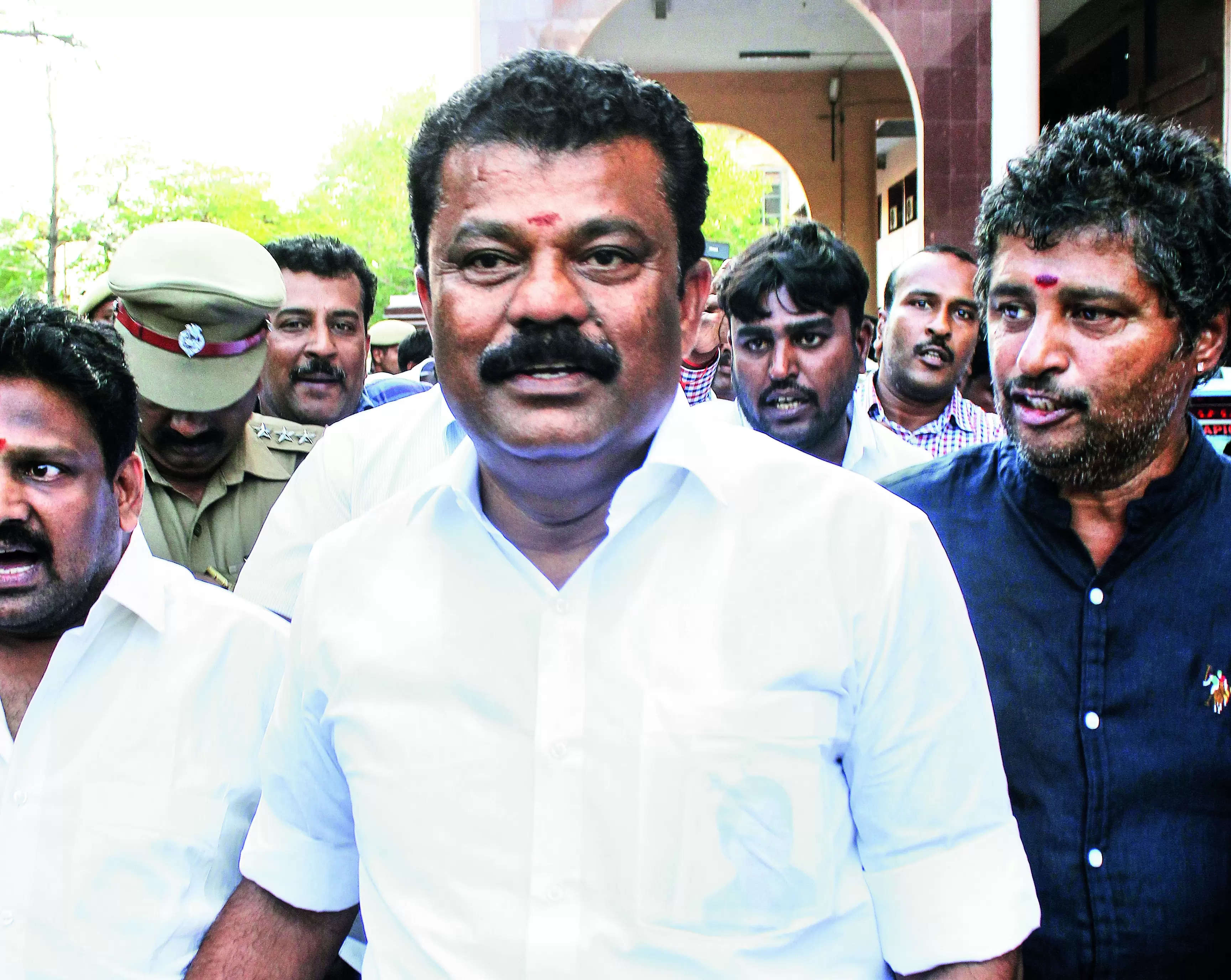 High court acquits former minister in riots case
