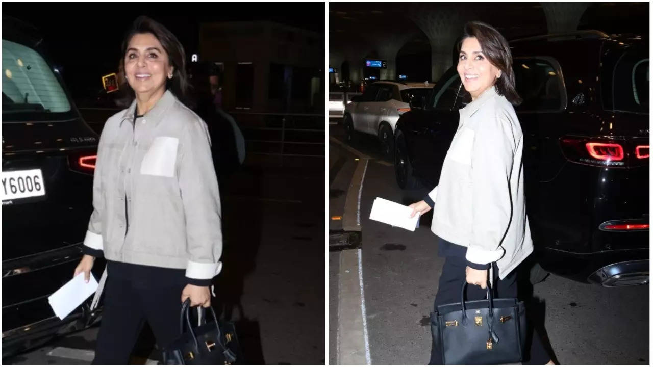 Pics: Neetu Kapoor arrives at the airport in style