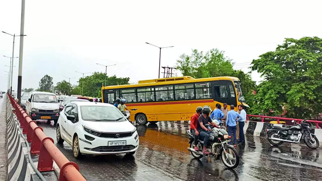 School bus crashes into Noida Elevated Road’s wall, hangs off it