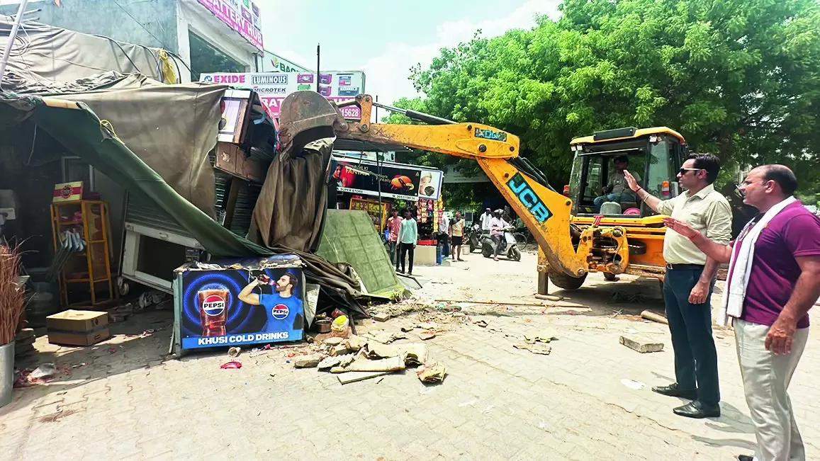 Illegal structures on MG Road razed in 2-day GMDA drive