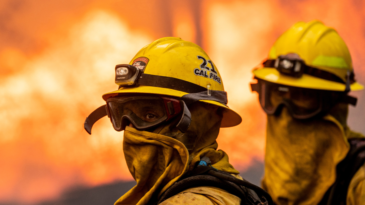 Largest wildfire in California this year started by a burning car pushed into a gully; 1 arrested