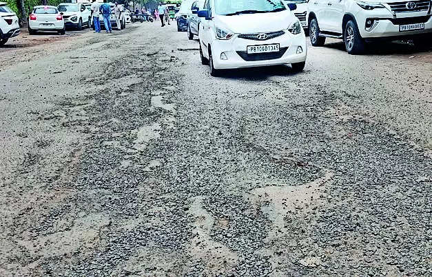 Roads damaged by rain leave commuters harried