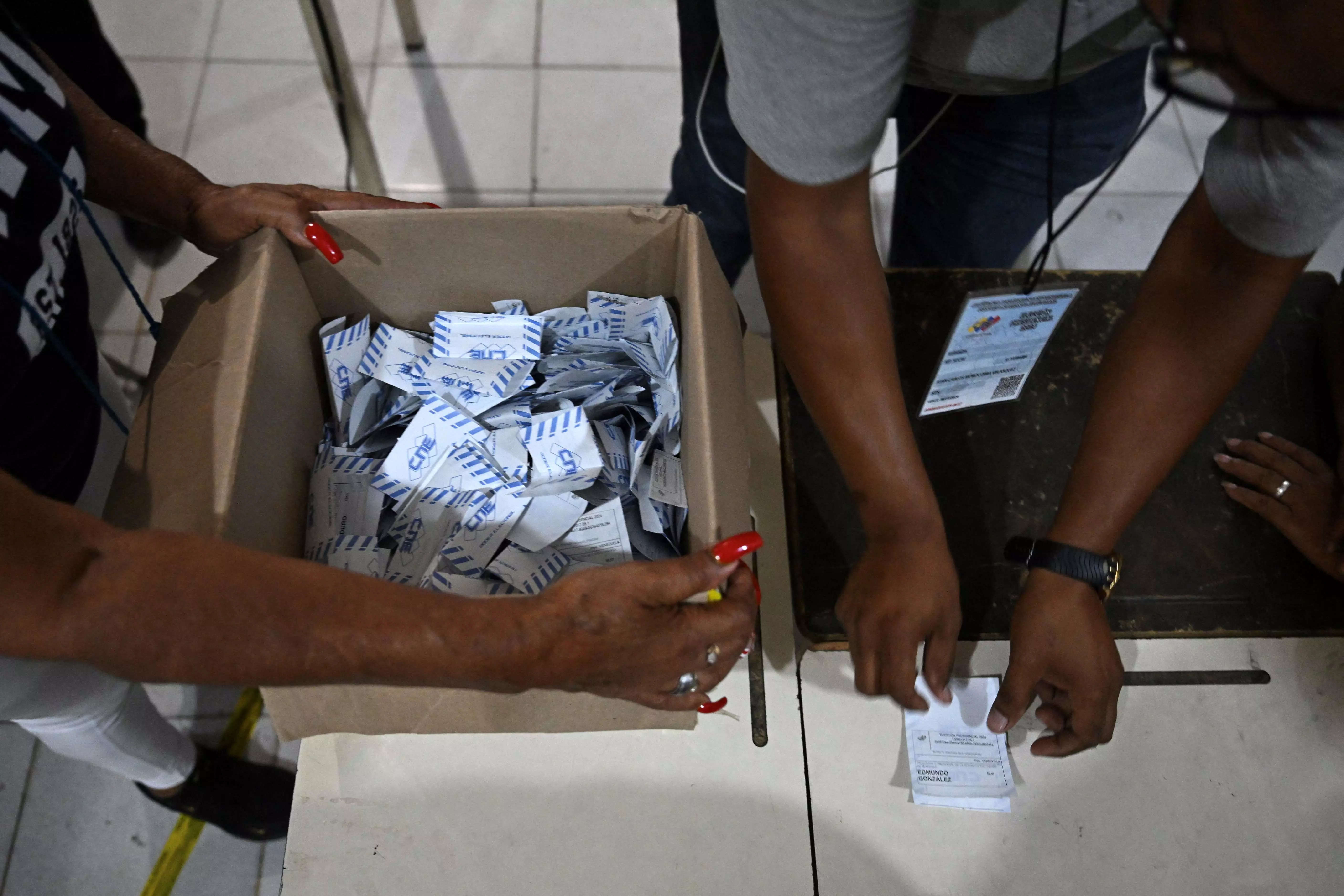 Millions turn out for Venezuelan presidential election amid fears of fraud and unrest