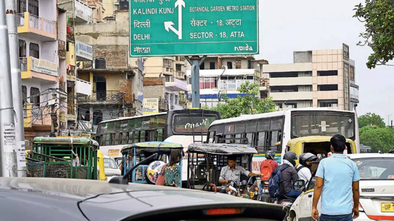 Garbage piles up by this road, vehicles move at snail’s pace