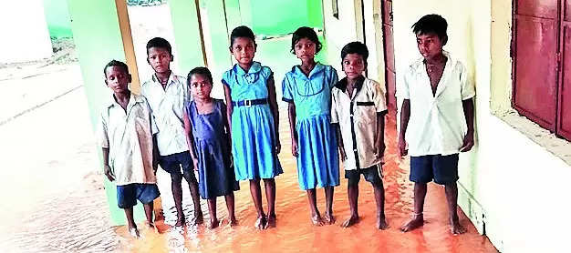 Kids struggle as rainwater floods S’garh school