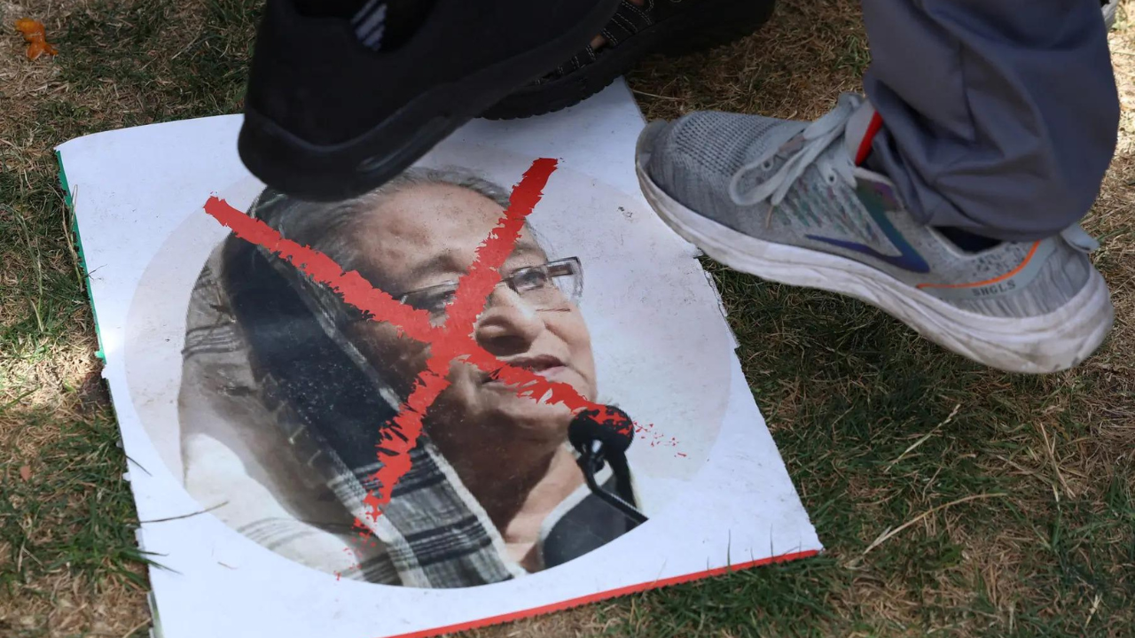 Shaken Hasina flees, Army in charge