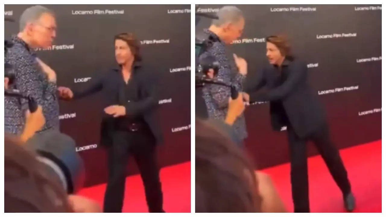 Did SRK push an elderly man off the red carpet? - WATCH