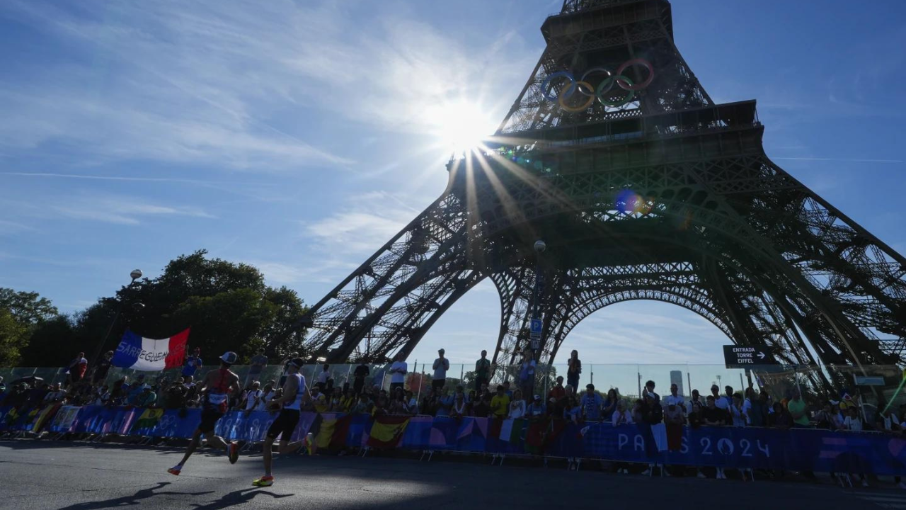 Eiffel Tower evacuated after man climbs up ahead of Paris Olympics closing ceremony