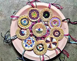 Women make rakhis using foodgrains, spices