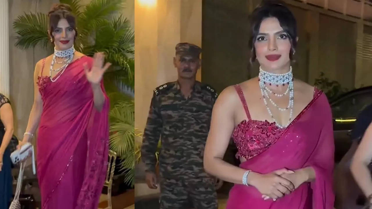 Priyanka Chopra exudes grace and elegance in a magenta saree, schools security for pushing paps at her brother’s wedding festivities