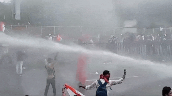 Watch: Saffron-clad protester facing water cannon triggers TMC-BJP showdown