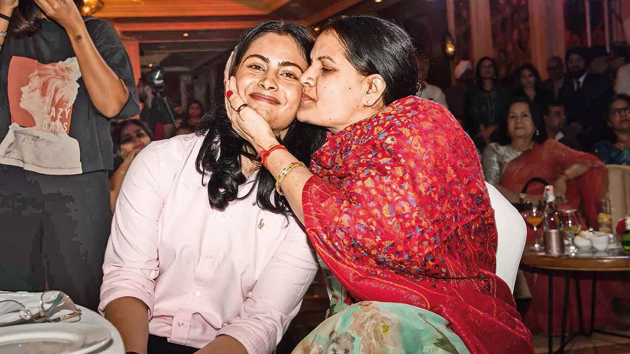 Hugs, kisses and pride! Manu with her mom Sumedha, her biggest cheerleader
