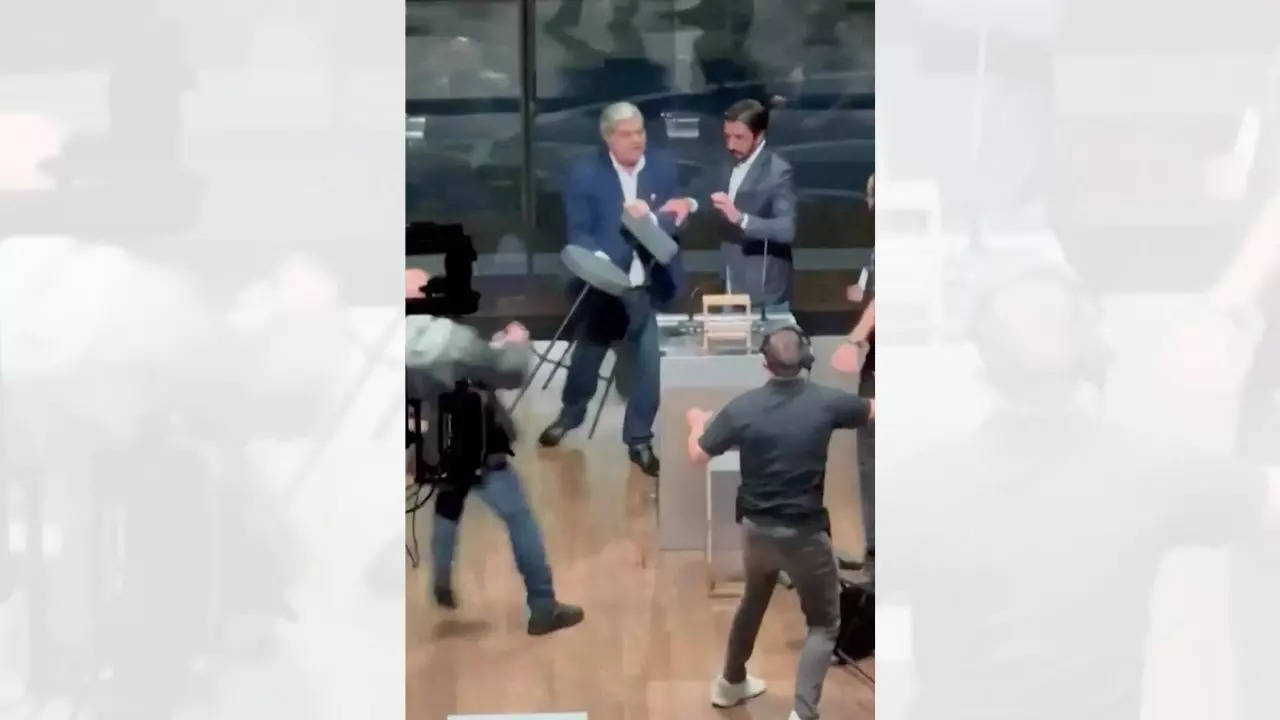 Watch: Brazil mayoral debate spirals out of control after candidate throws chair at rival