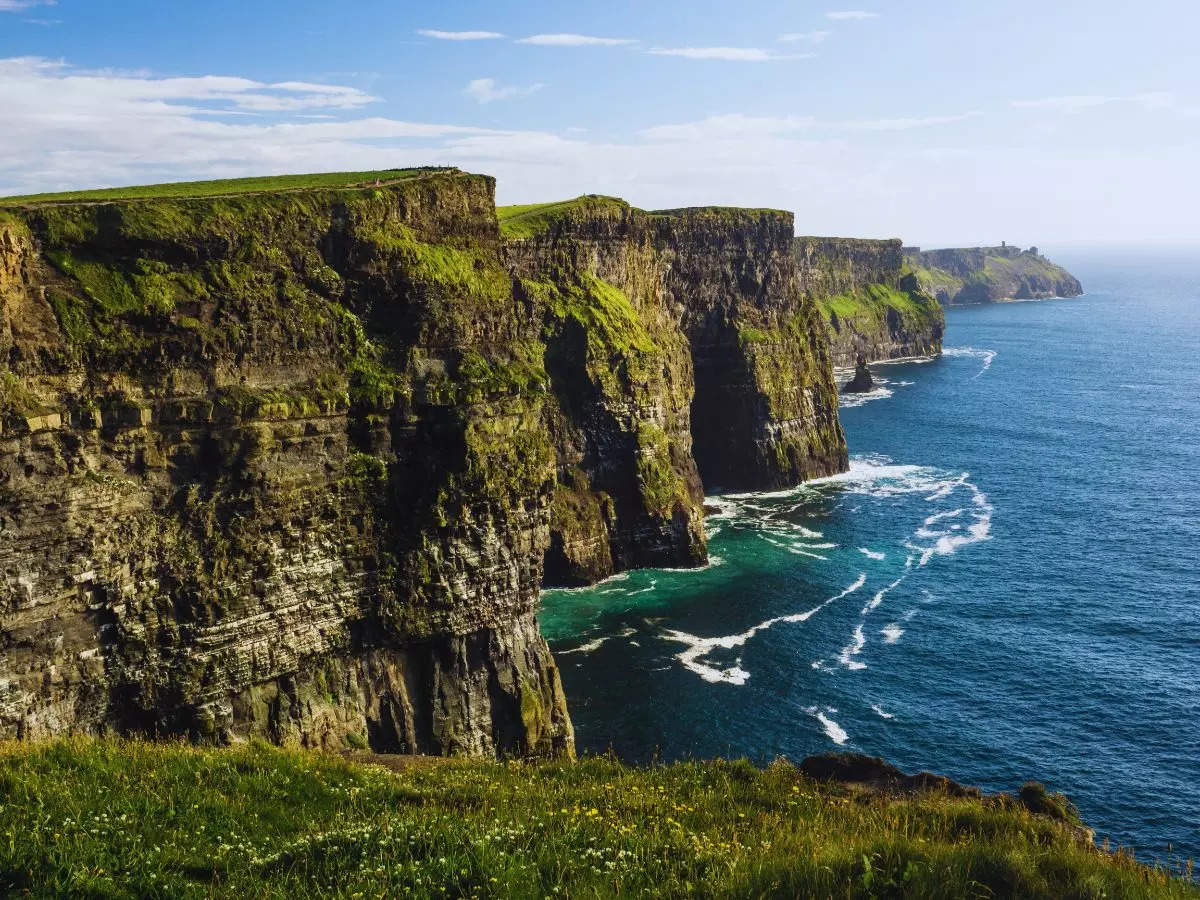 What makes Cliffs of Moher a must visit attraction in Ireland?