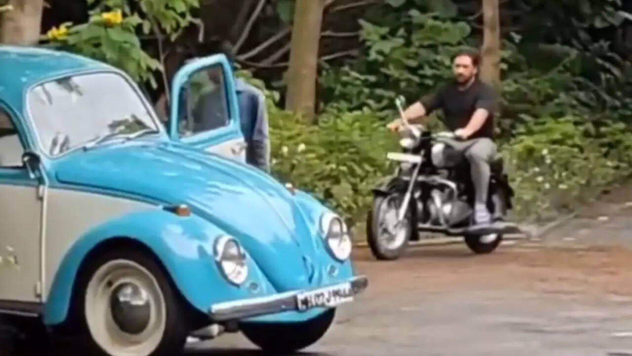 Viral video: Long-haired Dhoni riding bike in slippers