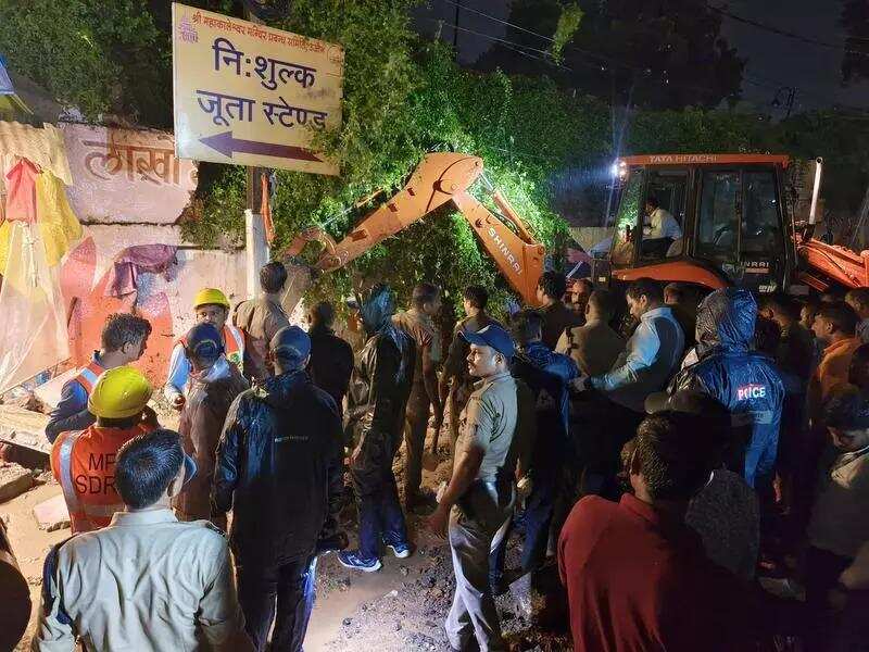 Wall collapse near Mahakal temple Two cops, two civic staffers, temple