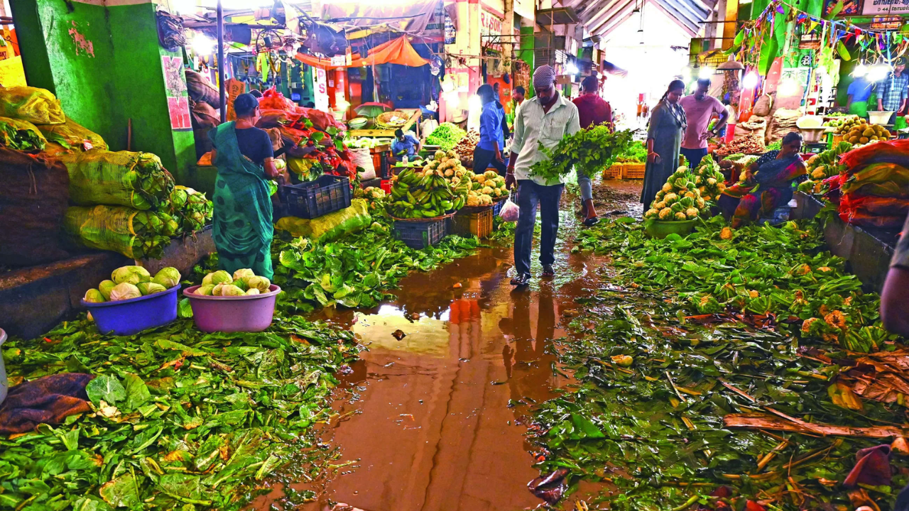 Rain leaves Chennai's Koyambedu market filthy, prices drop sharply