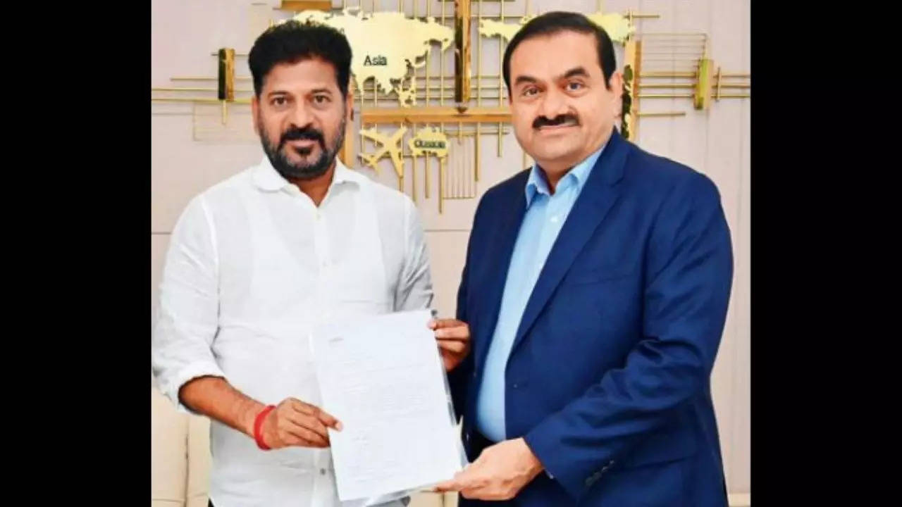 Gautam Adani hands over Rs 100 crore to CM Revanth Reddy for Skills varsity in Telangana