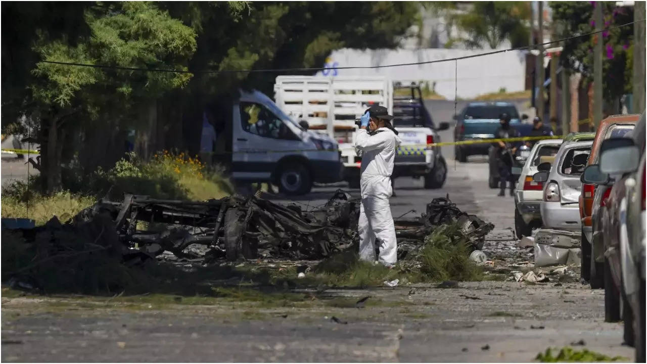 A car bomb explodes outside a police station in western Mexico, wounding 3 officers