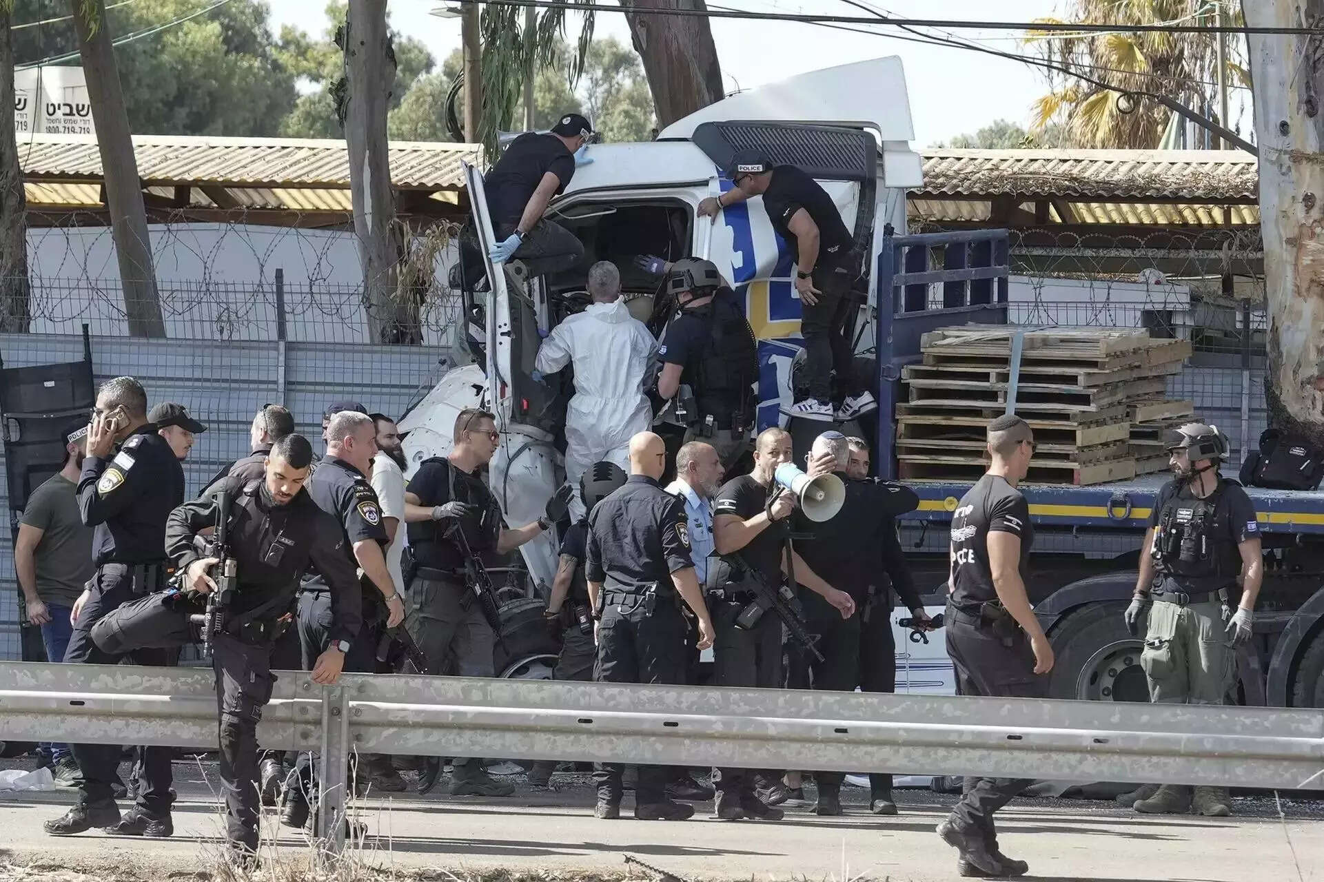One dead, 40 injured as truck rams a bus stop near Mossad HQ in Tel Aviv