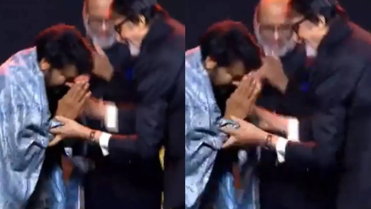 Chiranjeevi touches Big B's feet at award ceremony
