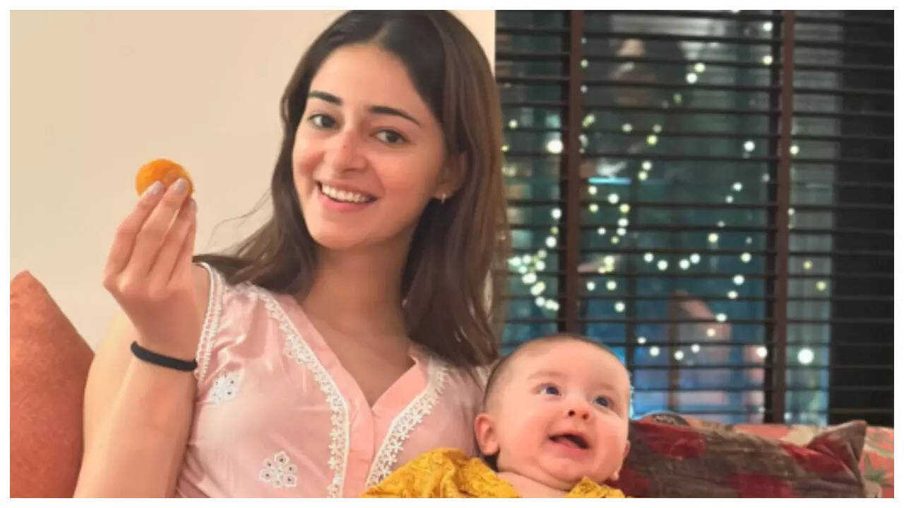 Ananya poses with Alanna's baby River on Diwali