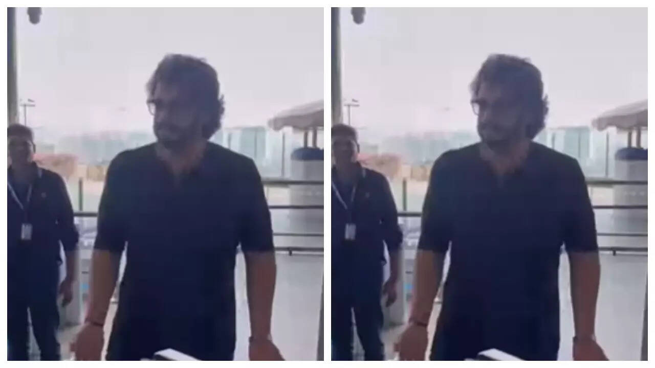 Arjun Kapoor snapped hugging pap at the airport