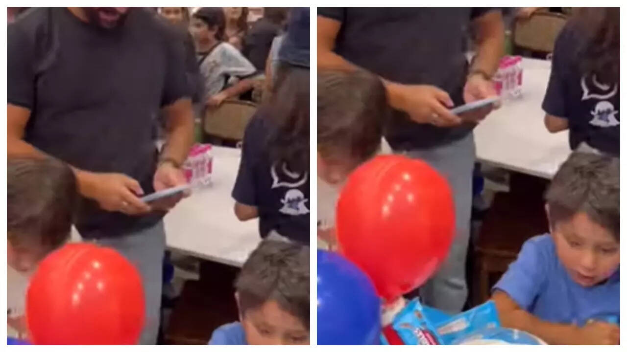 Jeh hides extra chocolate while dad Saif is busy