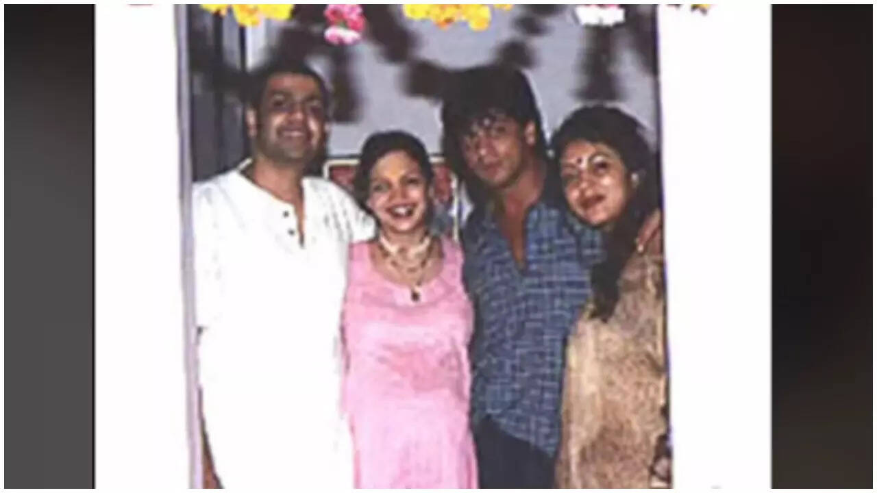 SRK holds pregnant Gauri close in this throwback pic