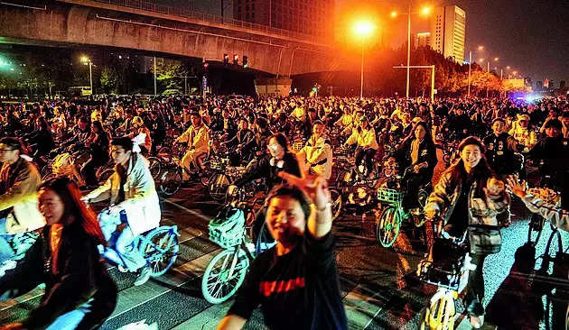 Night bike rides began over dumplings. Now, China is clamping down on them