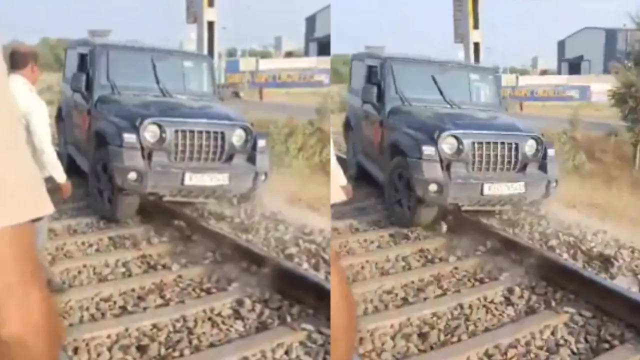 Mahindra Thar stunt for reel gone wrong, SUV trapped on railway track: Viral video – Times of India