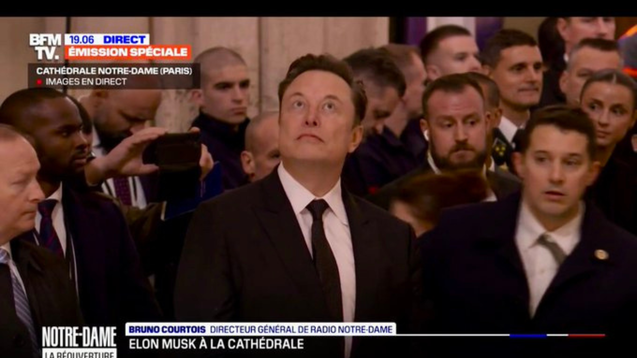 Elon Musk spotted in Notre Dame reopening television footage, obliges fan with selfie